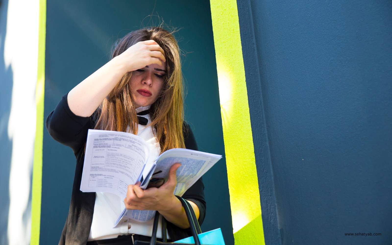 Anxious women reading papers